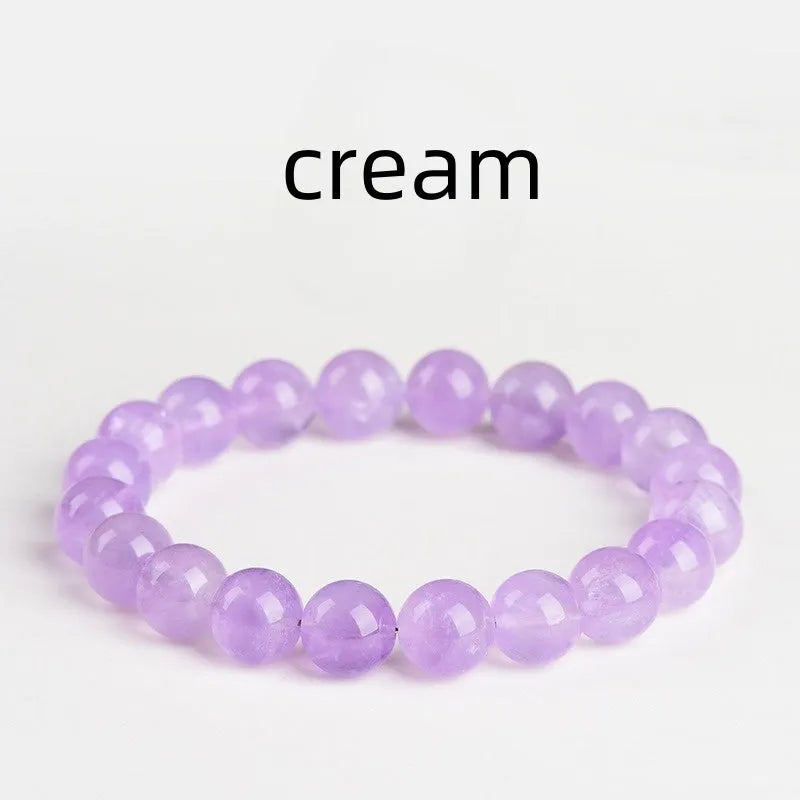 Amethyst crystal beaded bracelet with round lavender beads showing water ripple geometric pattern