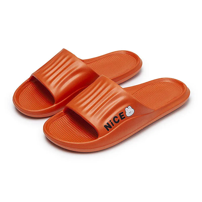 Adult unisex EVA bathroom slippers with cartoon pattern and non-slip sole in multiple colour options