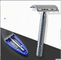 Double-edged safety razor kit with chrome finish, weighted handle, blades, and storage box