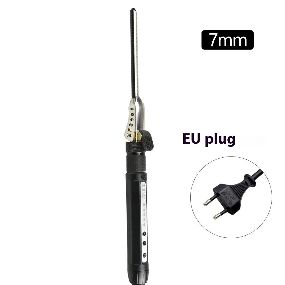 Black 7mm small hair curler with rotatable clip on a flat surface