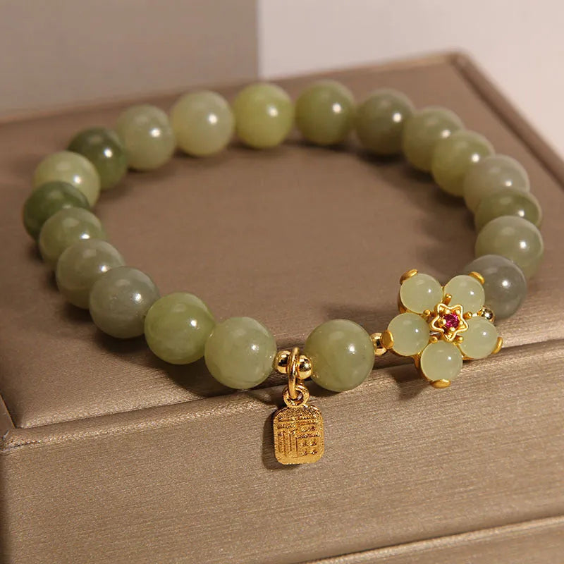 Women's casual bracelet with gray jade decoration and alloy construction