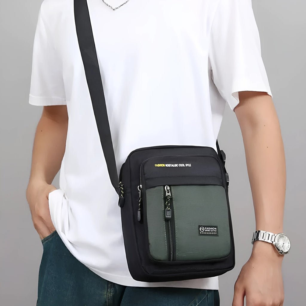 Men's nylon crossbody messenger bag with sewing thread details in green colour