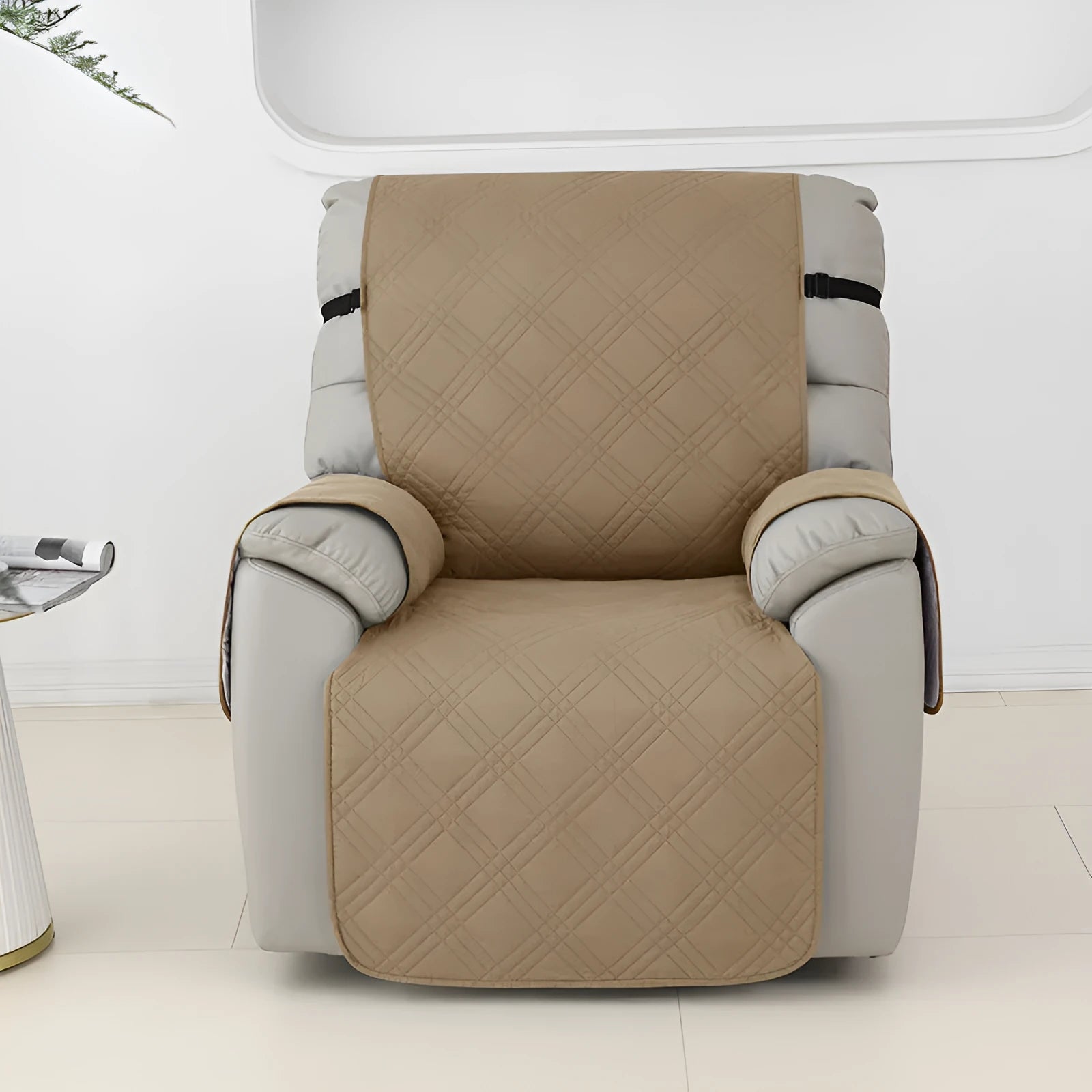 Quilted burgundy sofa cover on a Chivas massage chair