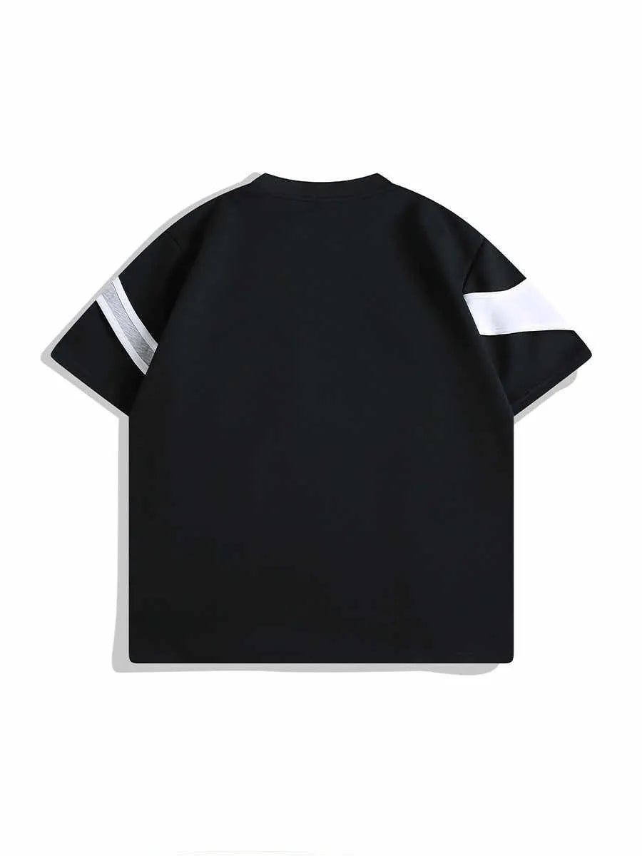 Loose fit black short sleeve T-shirt showing detail of double-layer stitched padded shoulder strap.