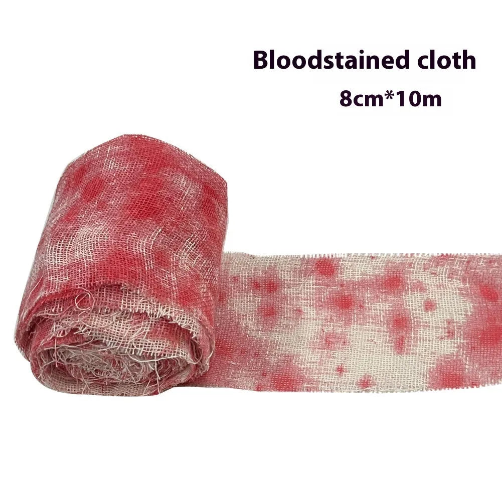 Roll of red Halloween horror gauze bandage with bloody dye effect, 8cm wide.