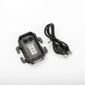 Portable mini tactical warning flashlight with USB charging cable on a backpack strap.