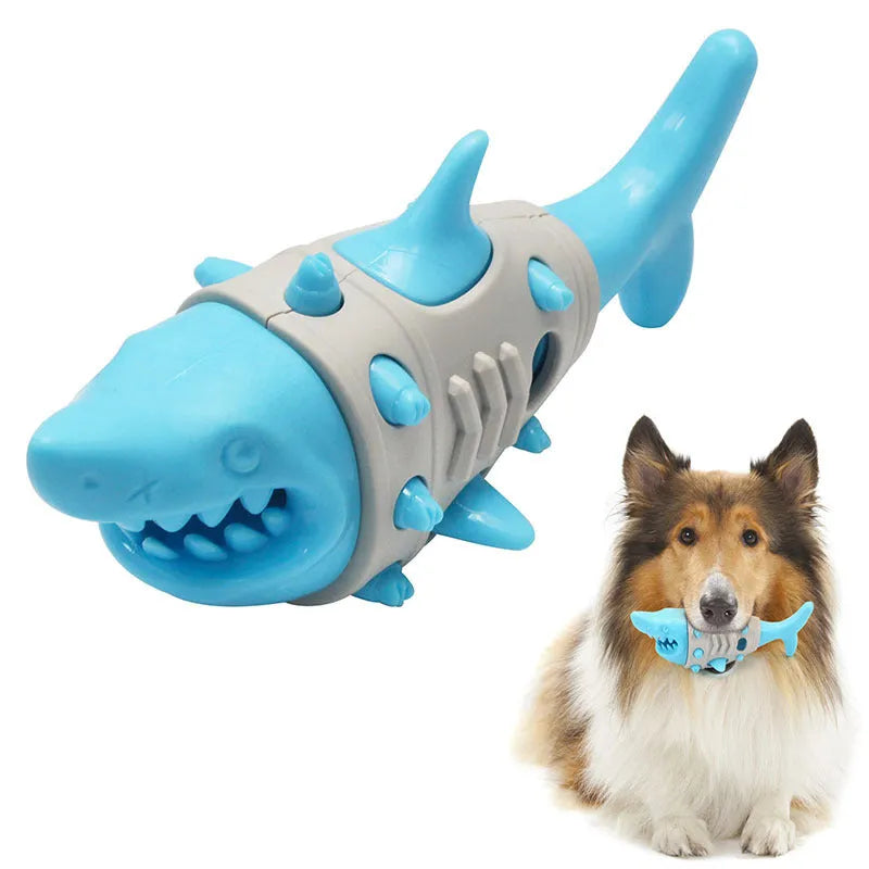 Blue, grey, and yellow shark-tooth shaped dog chew toy with textured surfaces and venting holes.