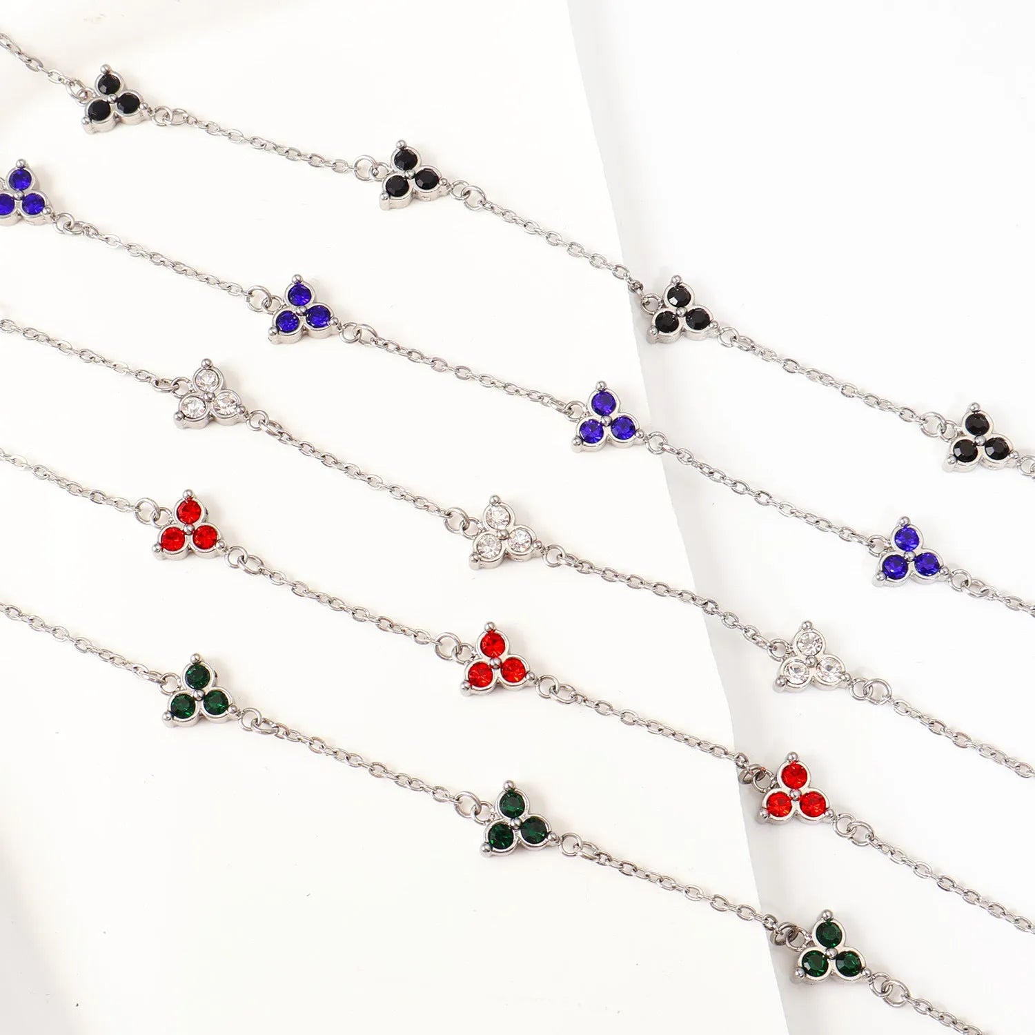 Women's stainless steel bracelet with three geometric diamond designs in various colour options