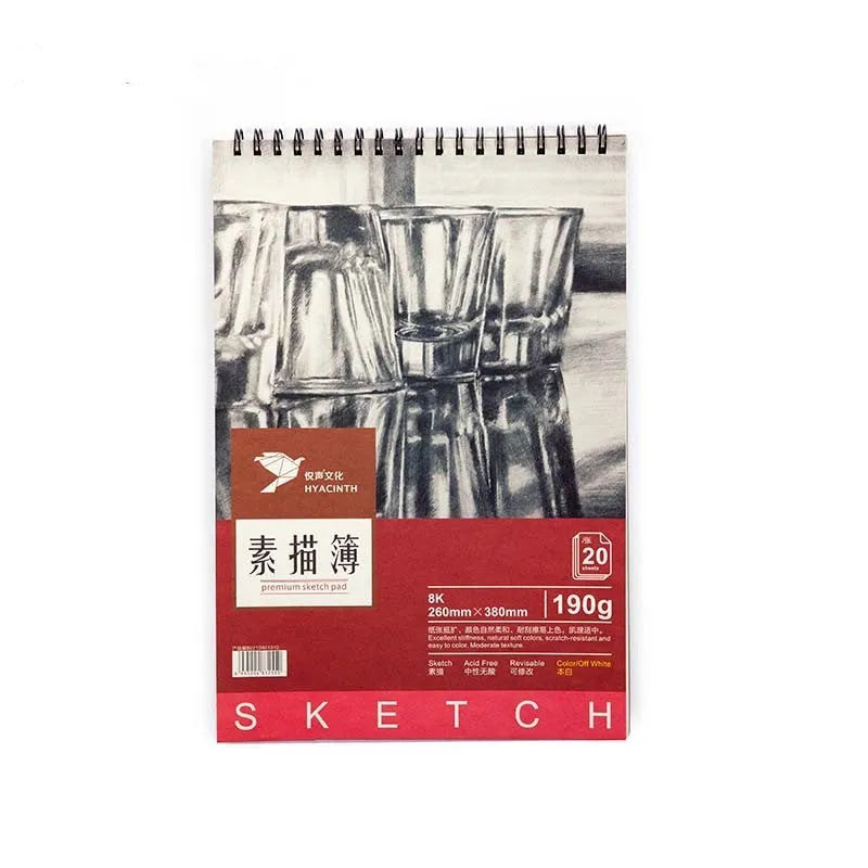 A4 artist sketch book showing coil bound, glue bound pad, and flip book binding options on a table with pencils.