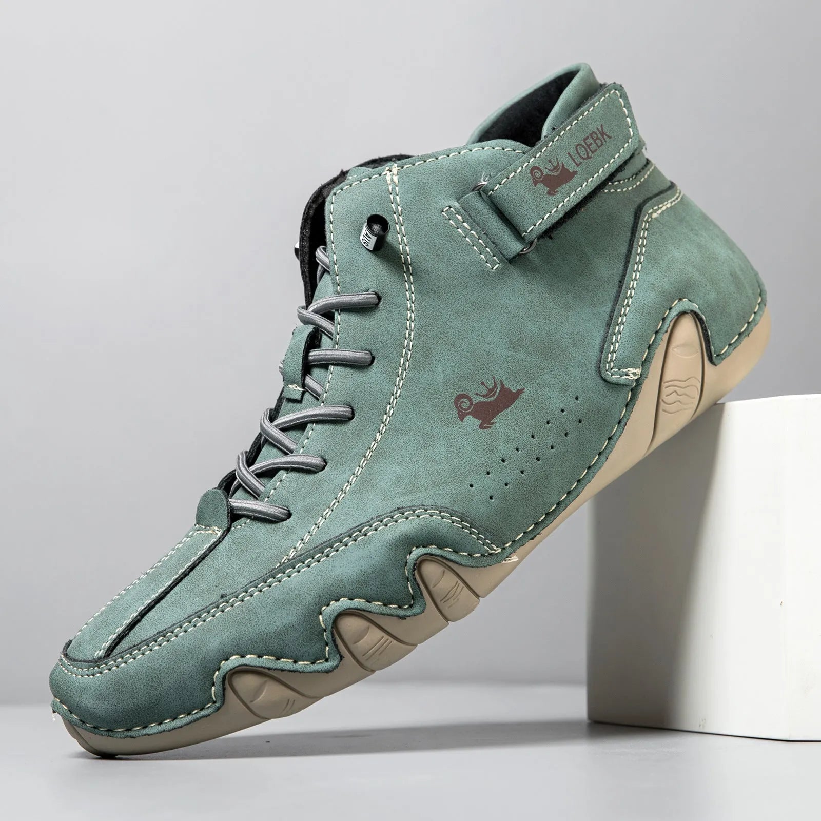 Men's brown high-top Octopus design Martin boots with a round toe and flat rubber sole.