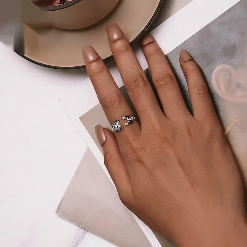 Adjustable sterling silver open ring with white gold plating and a detailed panda design.
