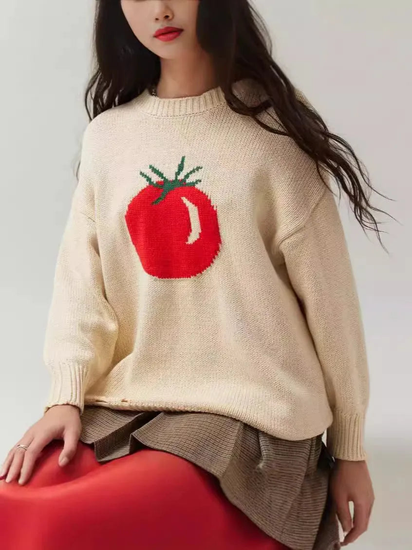 Beige women's loose-fitting acrylic jacquard pullover sweater with round neck and long sleeves.