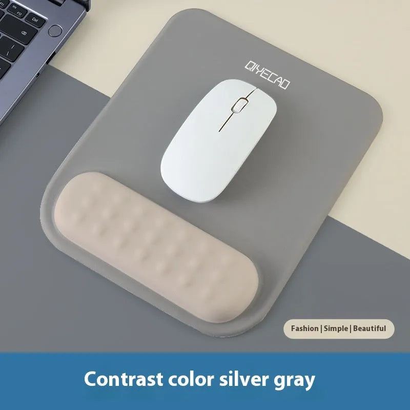 Ergonomic cloth silicone mouse pad with raised wrist support in mint green colour.