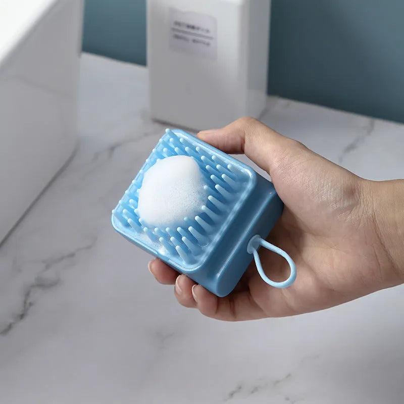Pet bath massage brush with soft TPR bristles and ergonomic handle in white, blue, pink, yellow colours