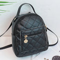 Girls' hard case Korean-style embroidered backpack in pink showing vertical square shape and soft carry handle.