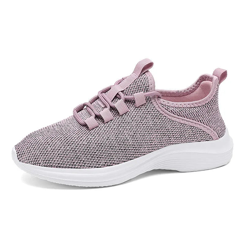 Women's low-top casual sneakers in black, grey, or pink with breathable mesh upper and lightweight EVA sole.
