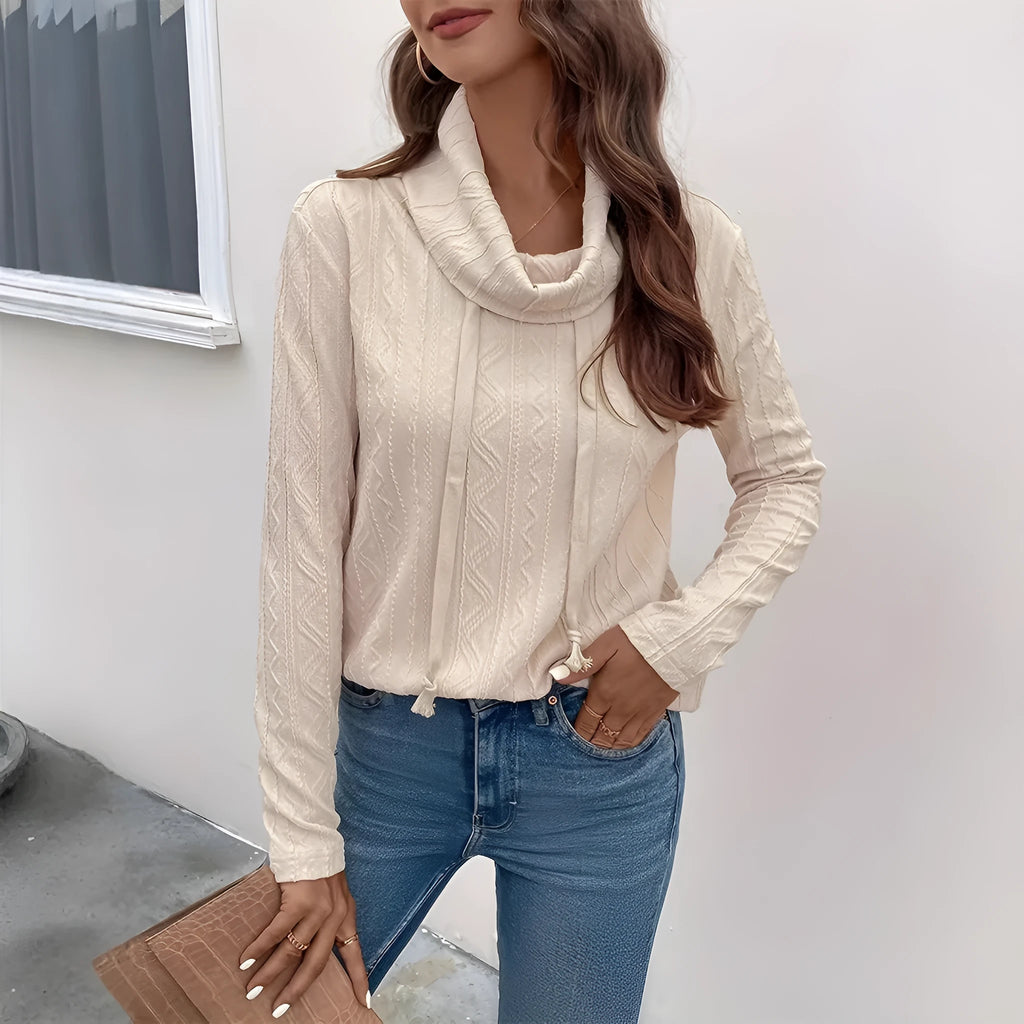 Apricot coloured hooded pullover sweater with drawstring and long sleeves