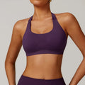 Women's halter neck yoga sports bra with removable pads in various colours.