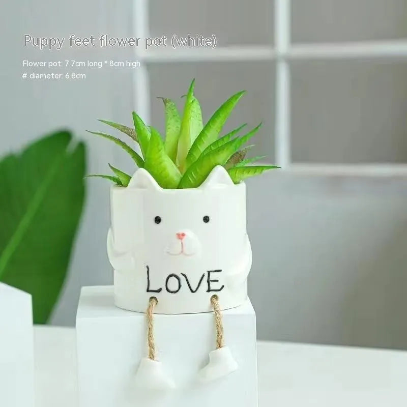 Ceramic hanging foot flowerpot in a cartoon style for desktop succulents.