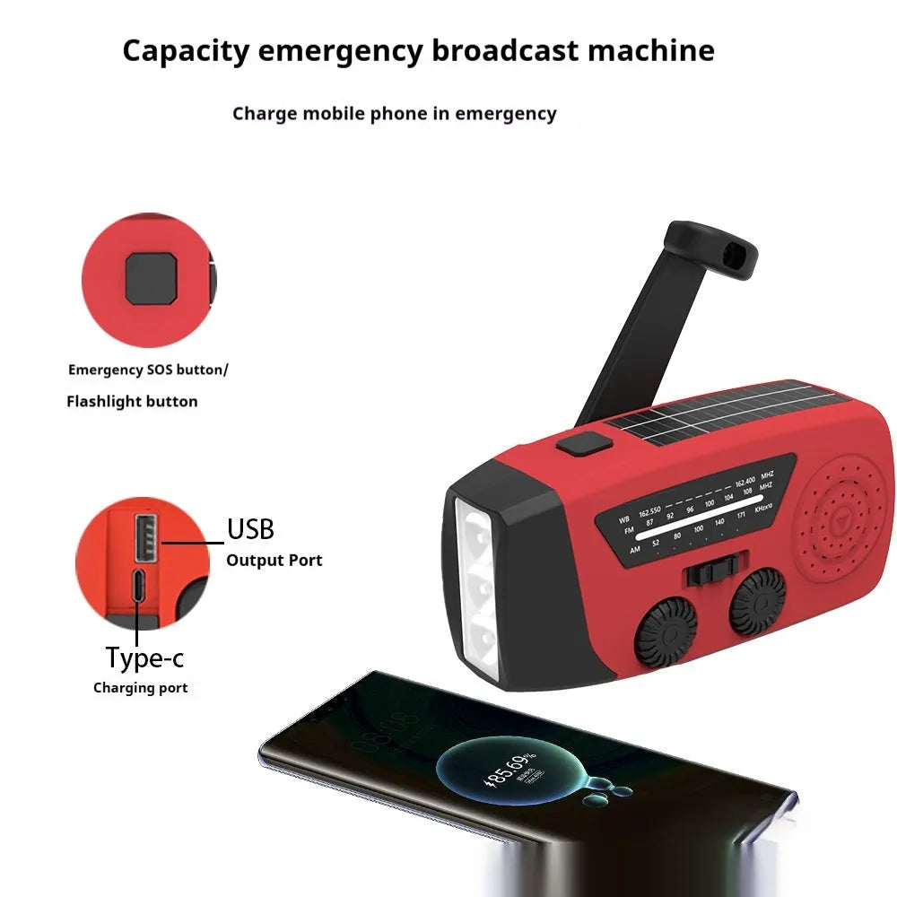 Red rechargeable handheld emergency radio and torch with wrist strap and USB port