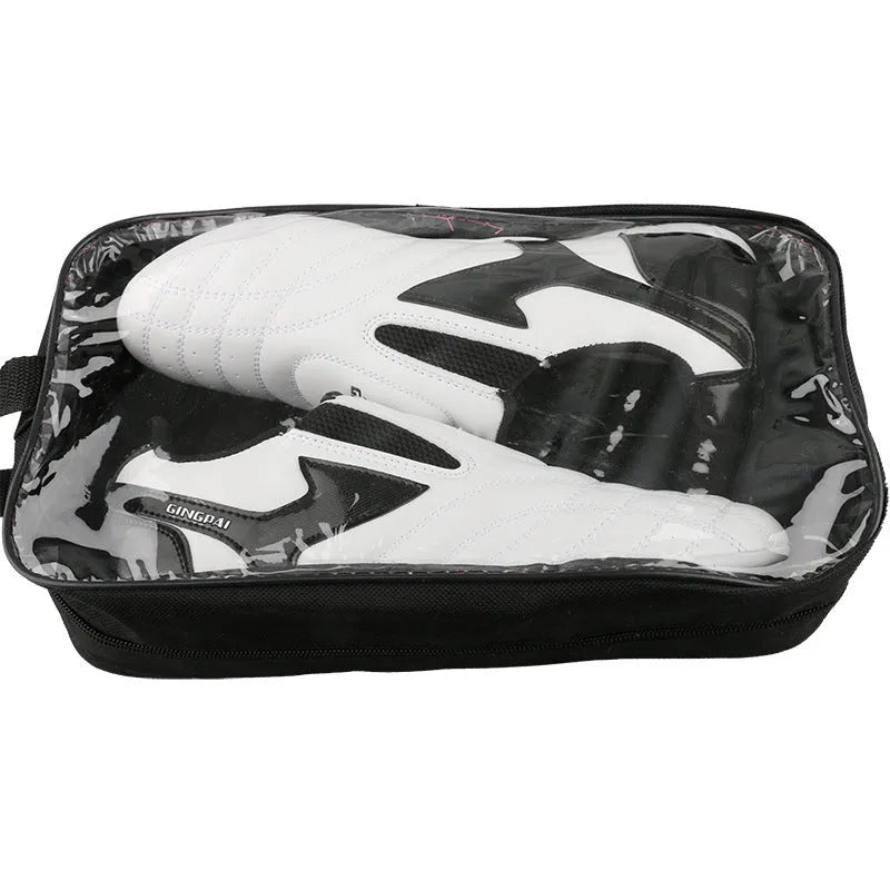 Black and white children's PU martial arts training shoes with soft sole for Taekwondo and Sanda.
