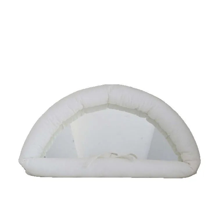 Rectangular white fabric mirror with soft filling hanging on a wall