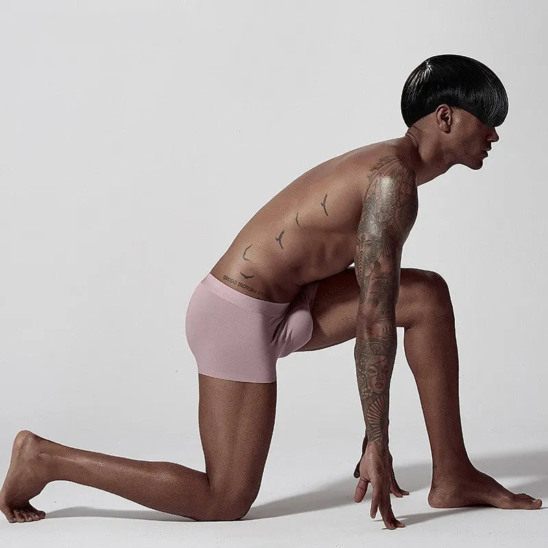 Seamless modal men's underwear in mid waist design showing white, pink and green colour options