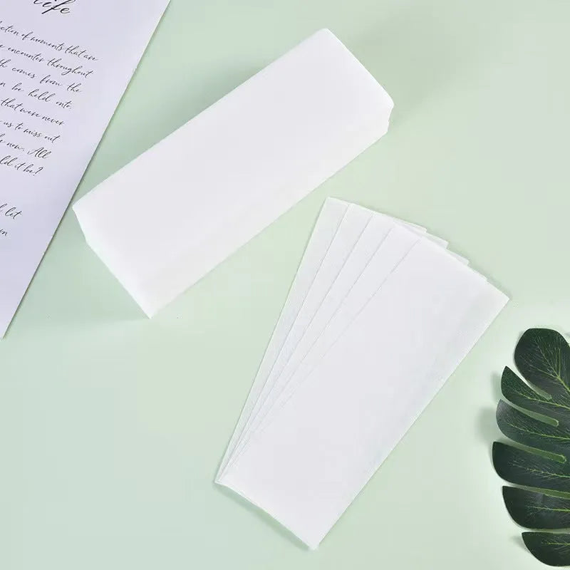 Non-woven fabric hair removal wax papers for waxing treatments in 50 or 100 piece packs