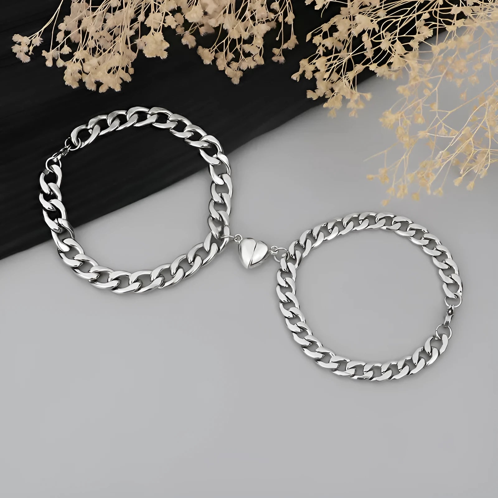 Silver magnetic couple bracelet with heart charm on stainless steel chain
