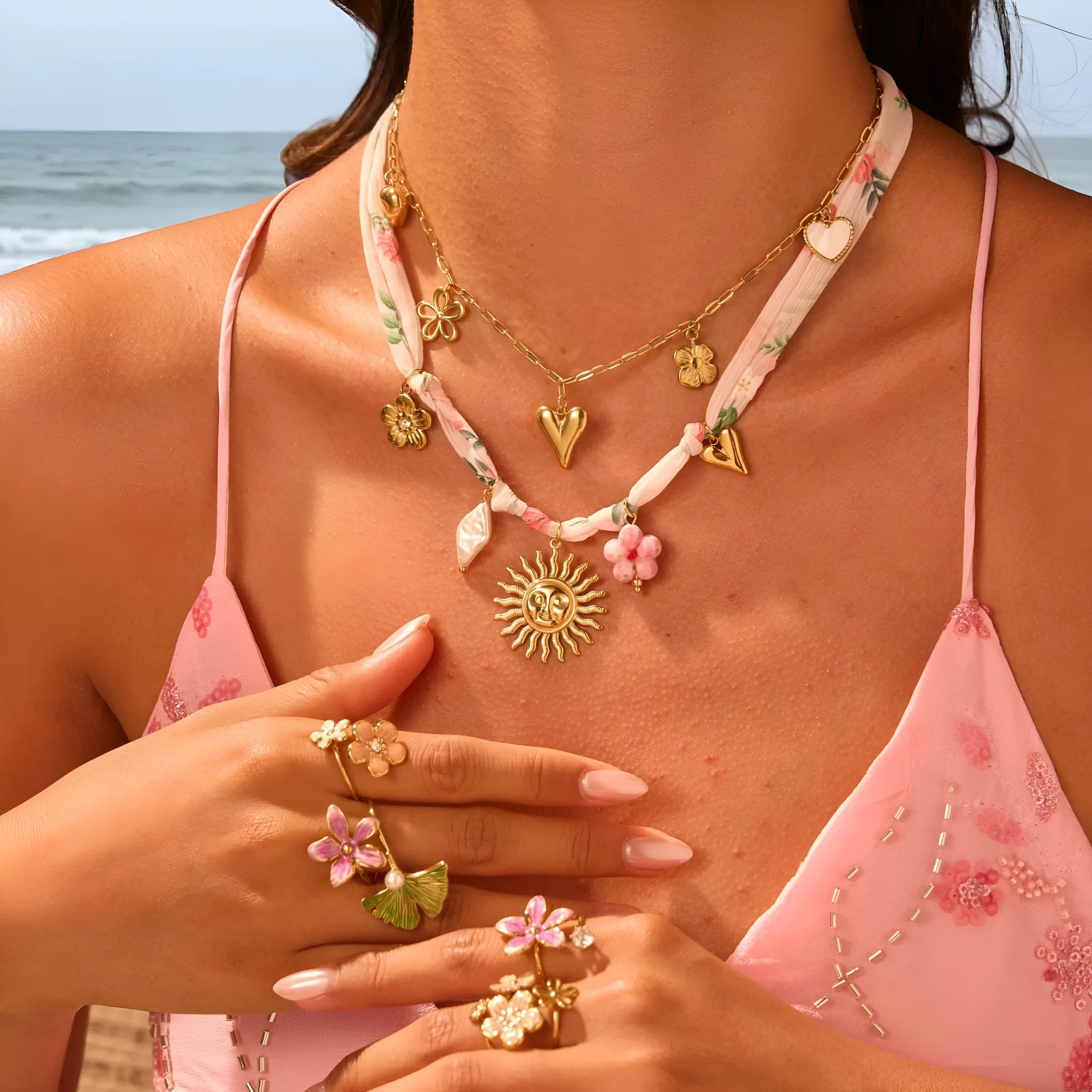 Stainless steel sun pendant necklace with geometric design on adjustable chain