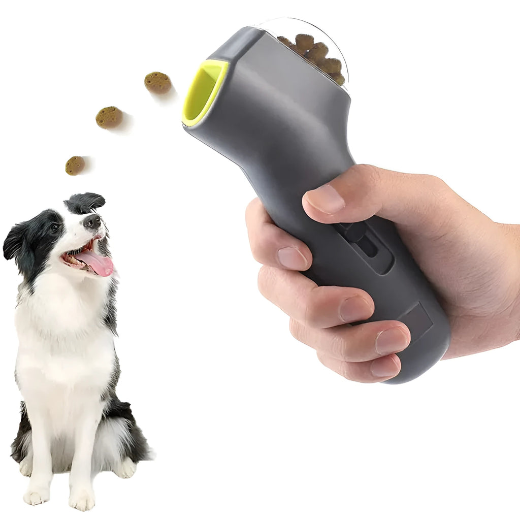 Grey pet snack catapult launcher for dogs and cats on a neutral background.