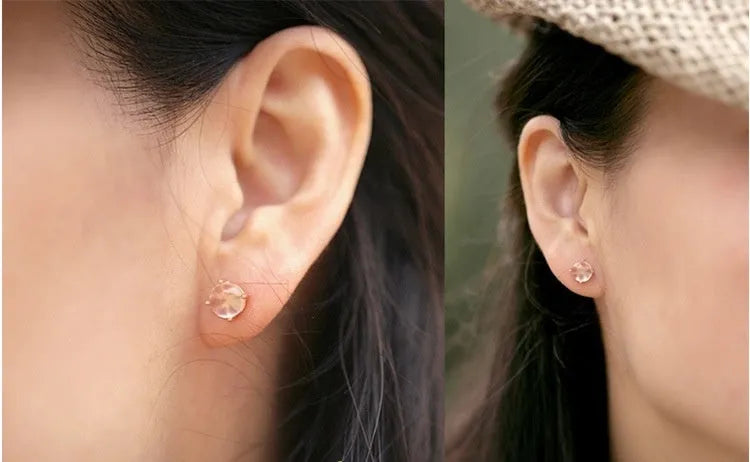 Rose gold coloured drop shaped stud earrings with synthetic ross quartz crystal inlay, Korean style design