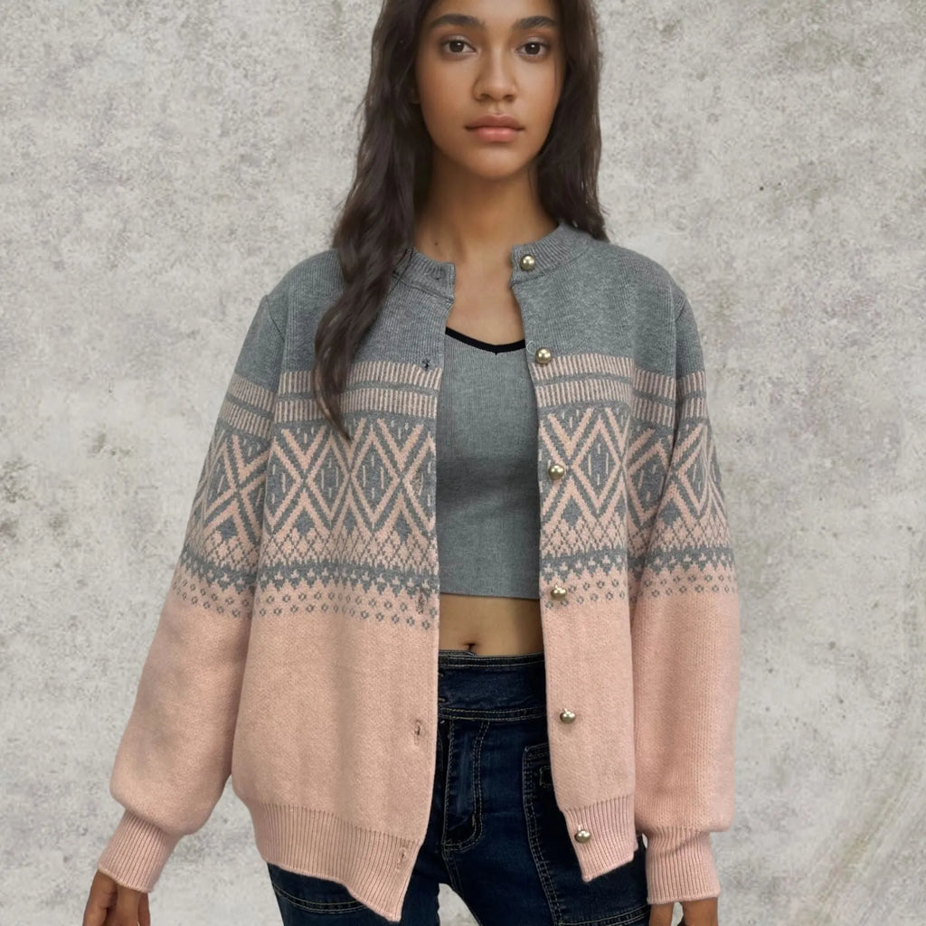 Women's red alpaca wool cardigan with diamond knit pattern and contrast colour long sleeves.