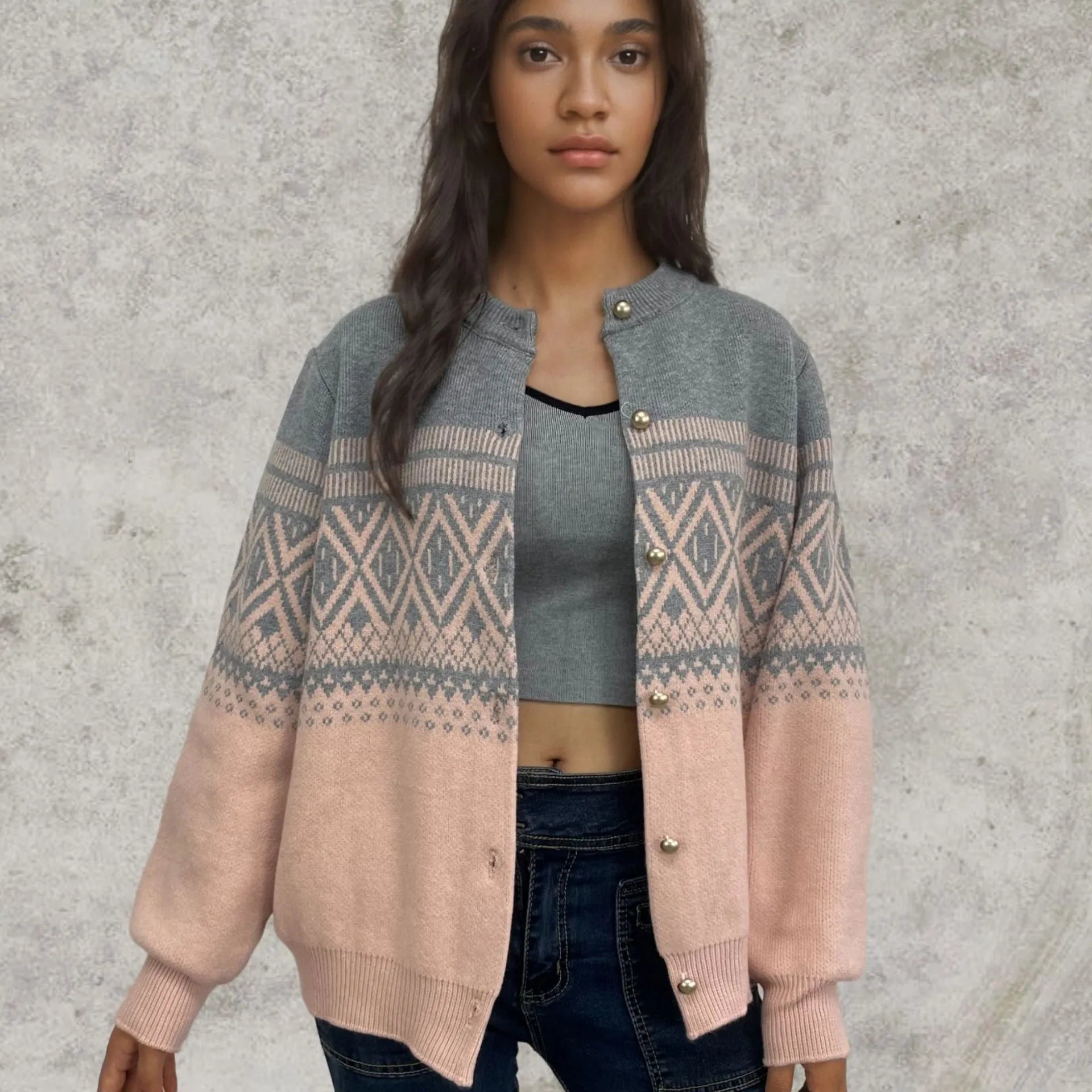 Women's red alpaca wool cardigan with diamond knit pattern and contrast colour long sleeves.