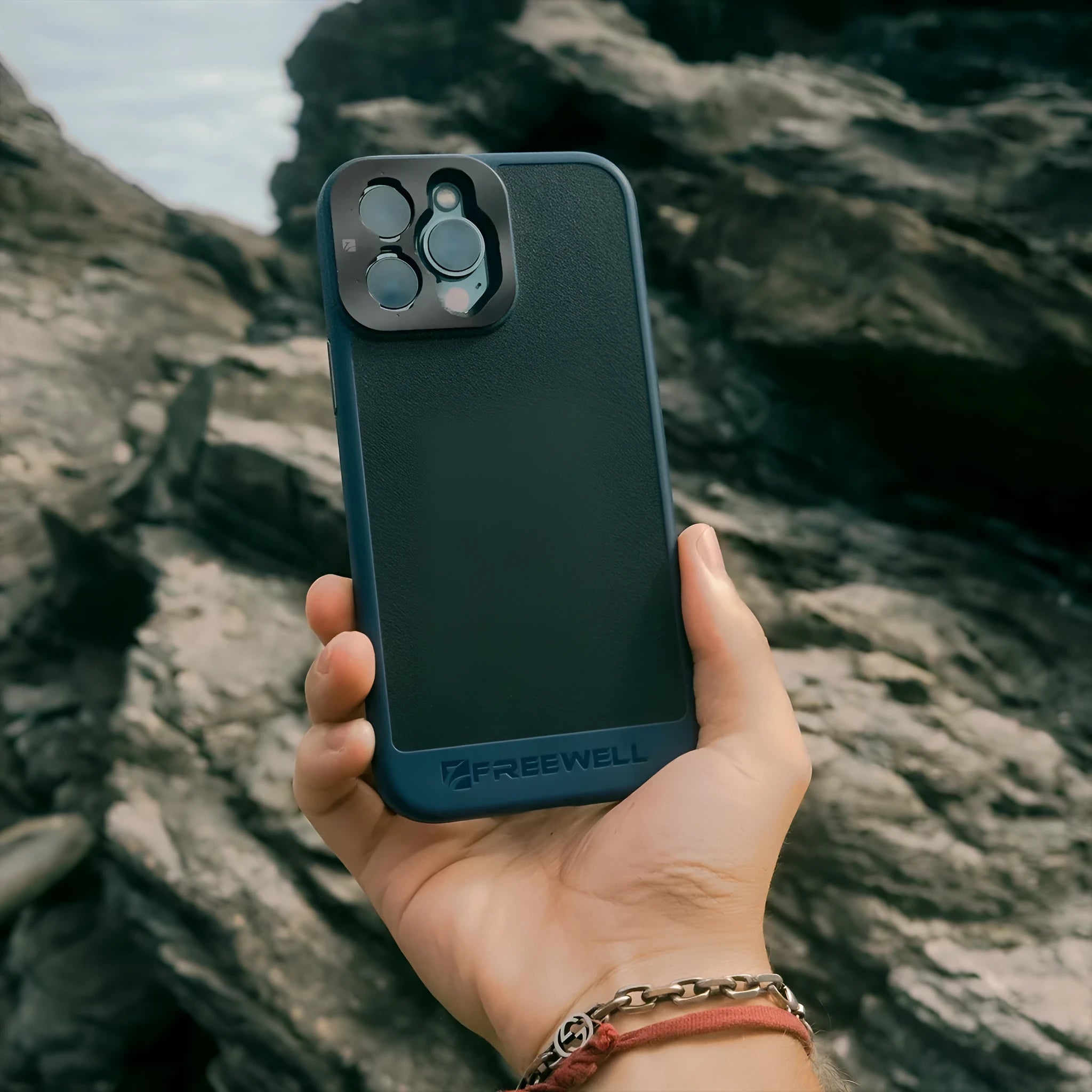 Black phone case compatible with iPhone 13 Pro, 14 Pro, and 15 Pro models