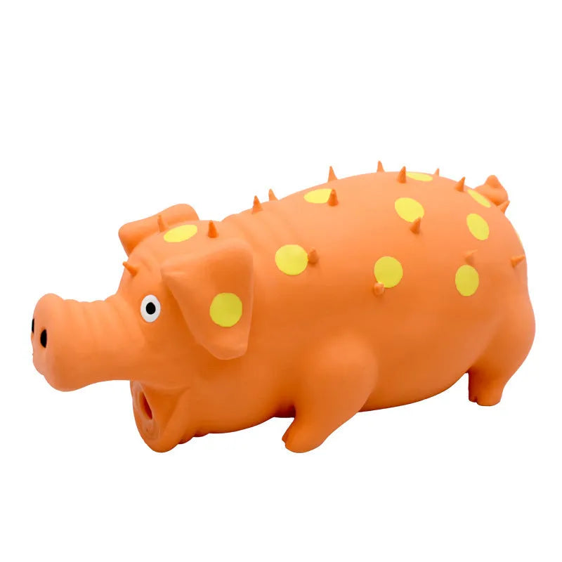 Latex pig-shaped dog chew toy with protruding grain texture in assorted colours