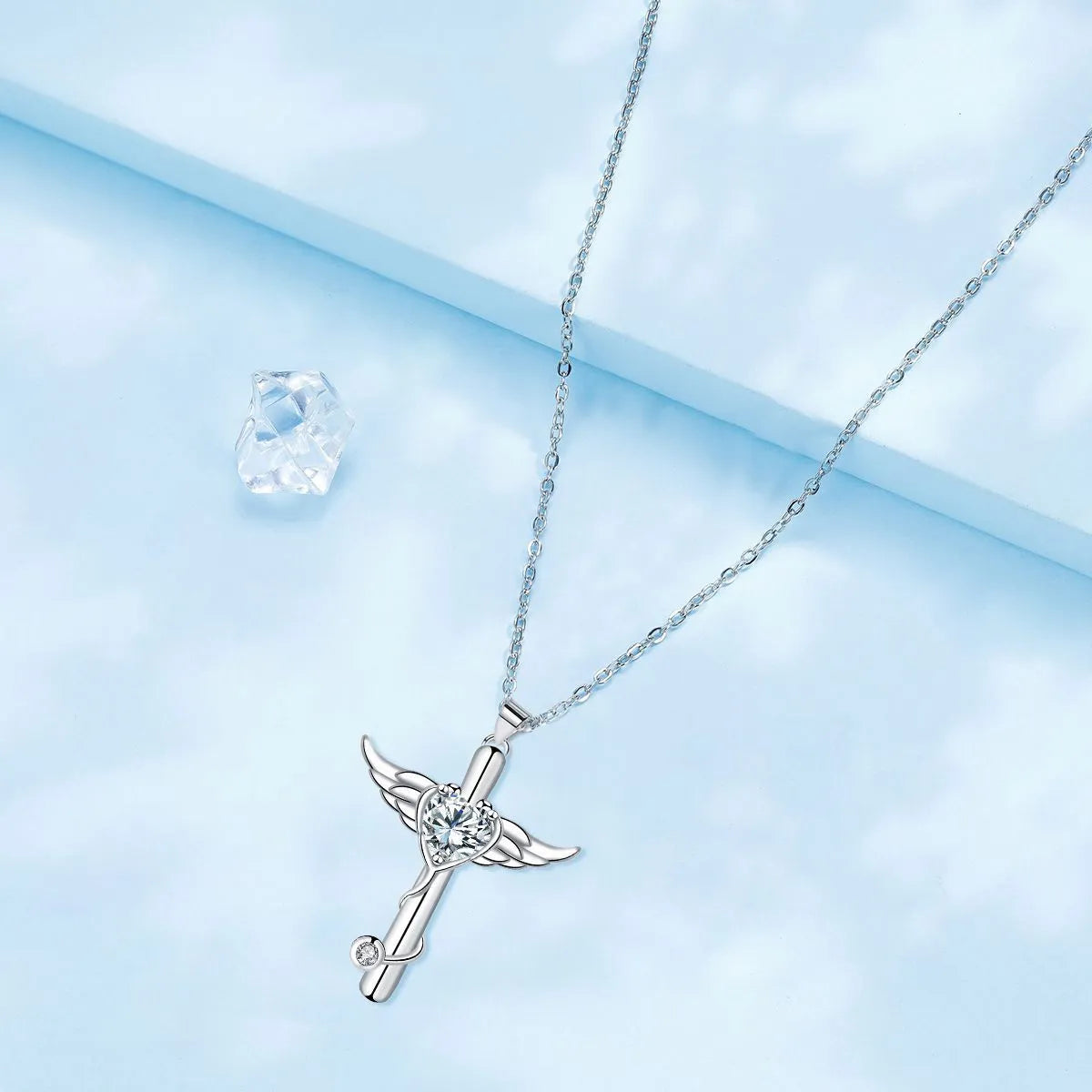 Women's cross stethoscope necklace with angel wings charm in electroplated finish