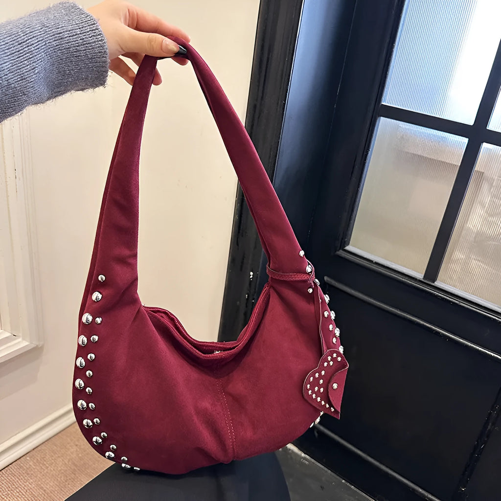 Soft plush retro style tote handbag for women in a choice of colours, shown as a strapless design.