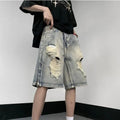 Blue retro denim shorts with tattered detailing and wide leg cut for summer wear