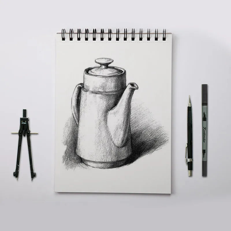 A4 artist sketch book showing coil bound, glue bound pad, and flip book binding options on a table with pencils.