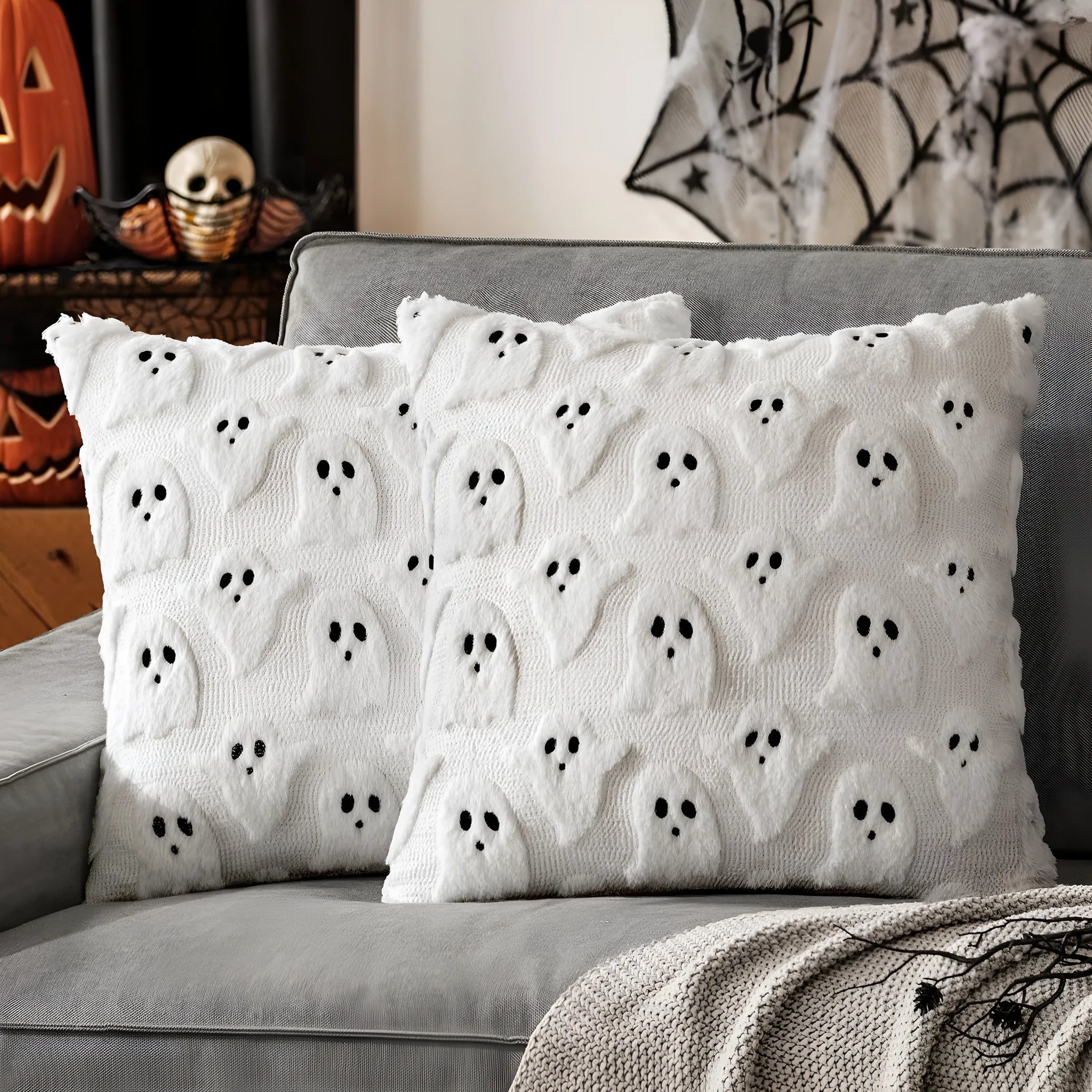Plush stereo ghost embroidered black and white holiday decorative cushion cover 45x45cm on sofa