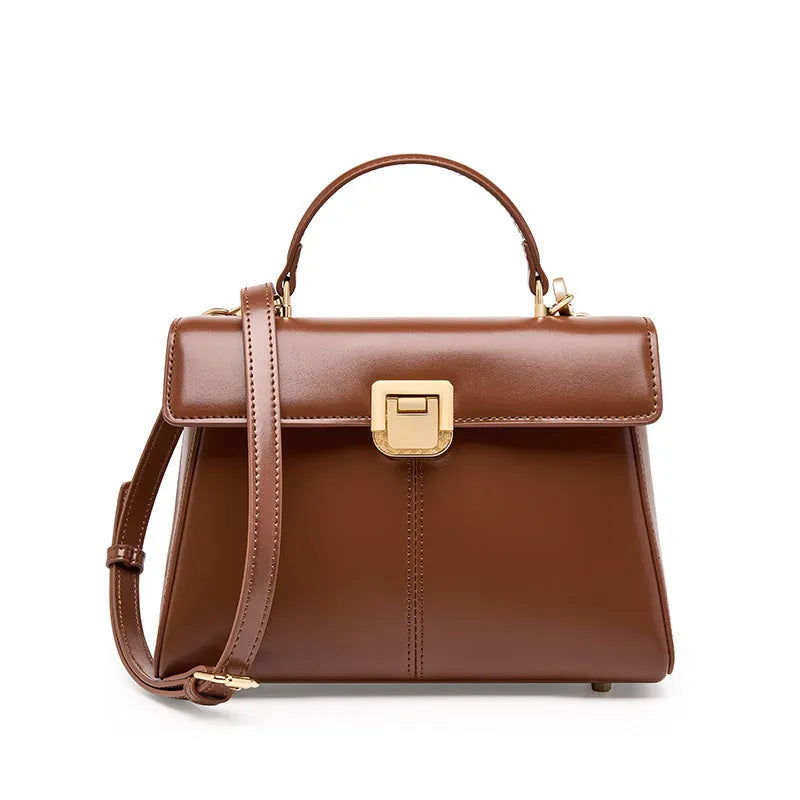 Women's genuine leather shoulder bag with vachette clasp in horizontal square design showing internal compartments