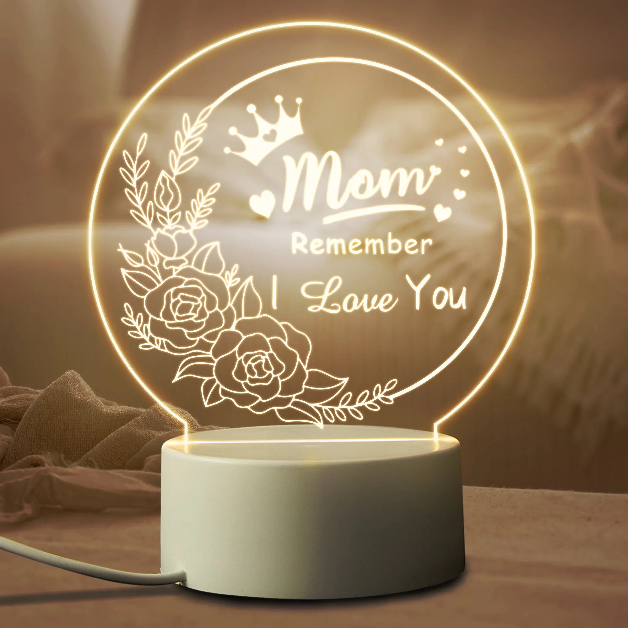 Modern white bedside night light with acrylic shade on ABS base, connected via USB cable.