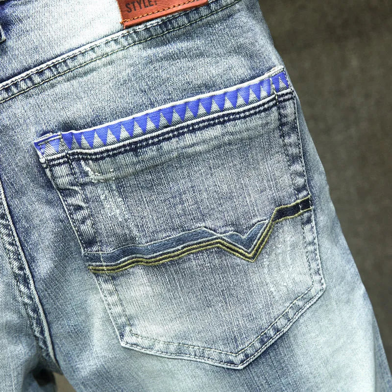 Men's light blue ripped casual jeans in cotton with distressed details, size 28 to 38