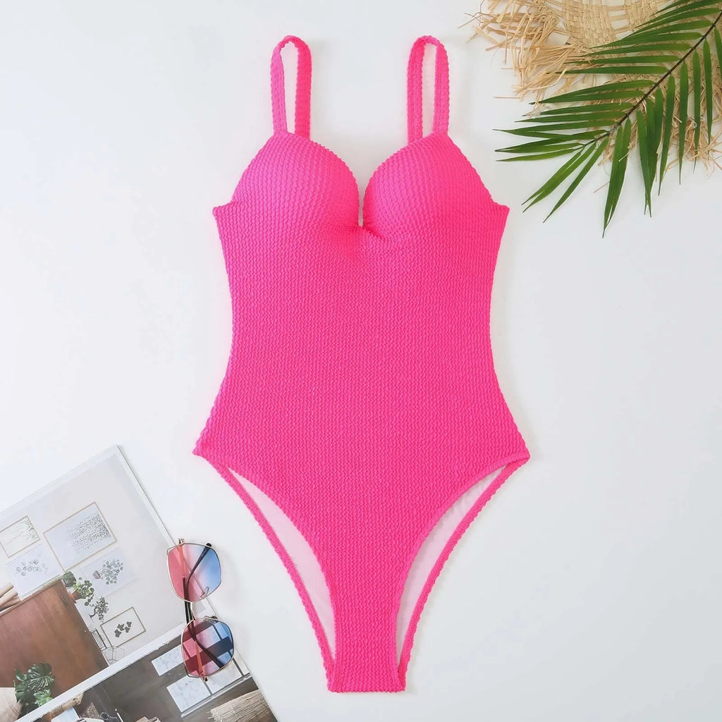 Women's sleeveless one-piece swimsuit with sunken stripe pattern in multiple colour options