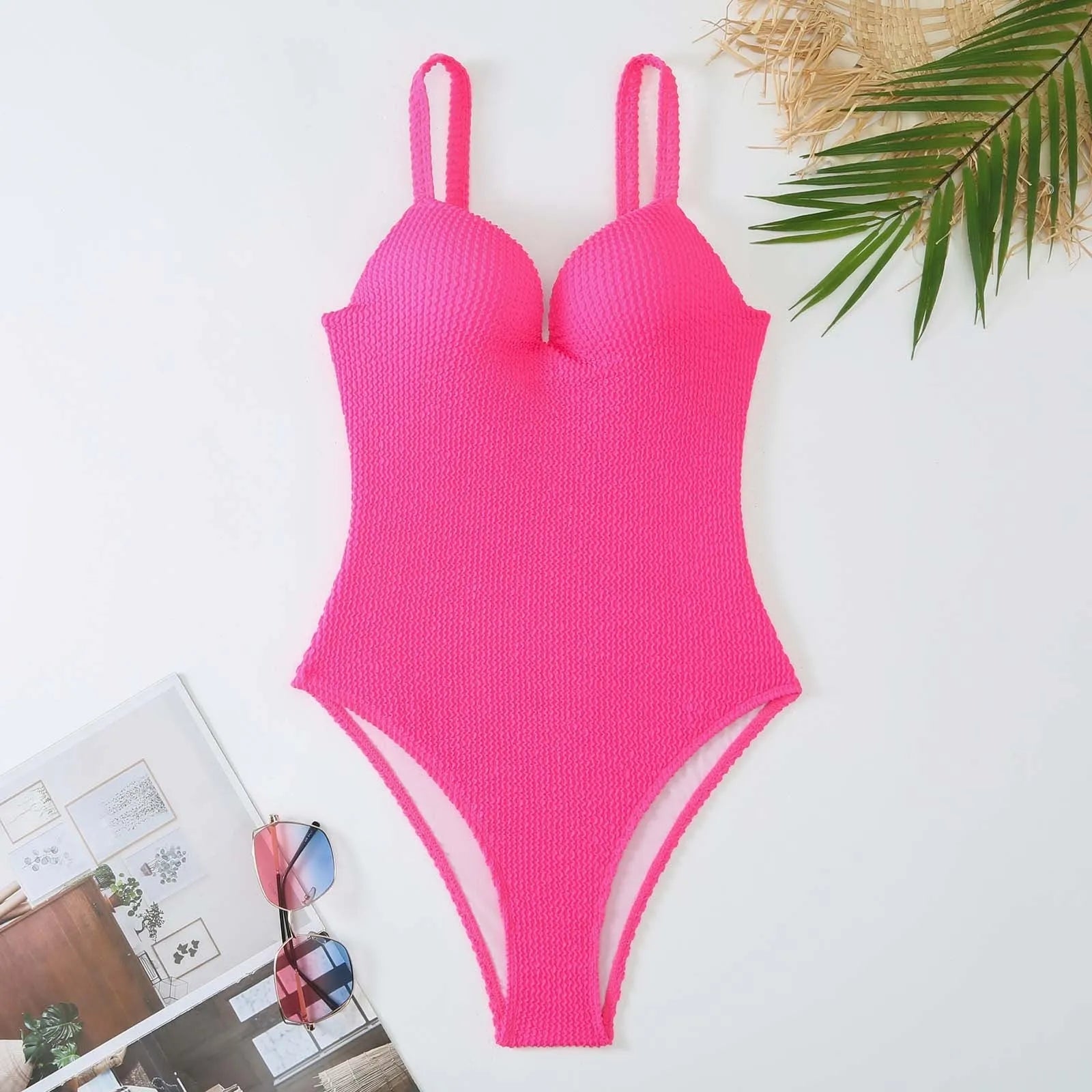 Women's sleeveless one-piece swimsuit with sunken stripe pattern in multiple colour options