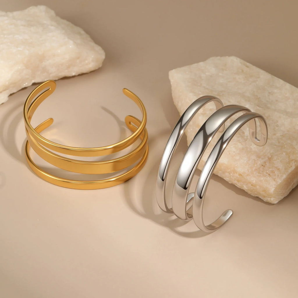 Women's stainless steel bracelet with 18K gold electroplating in geometric open design with line elements