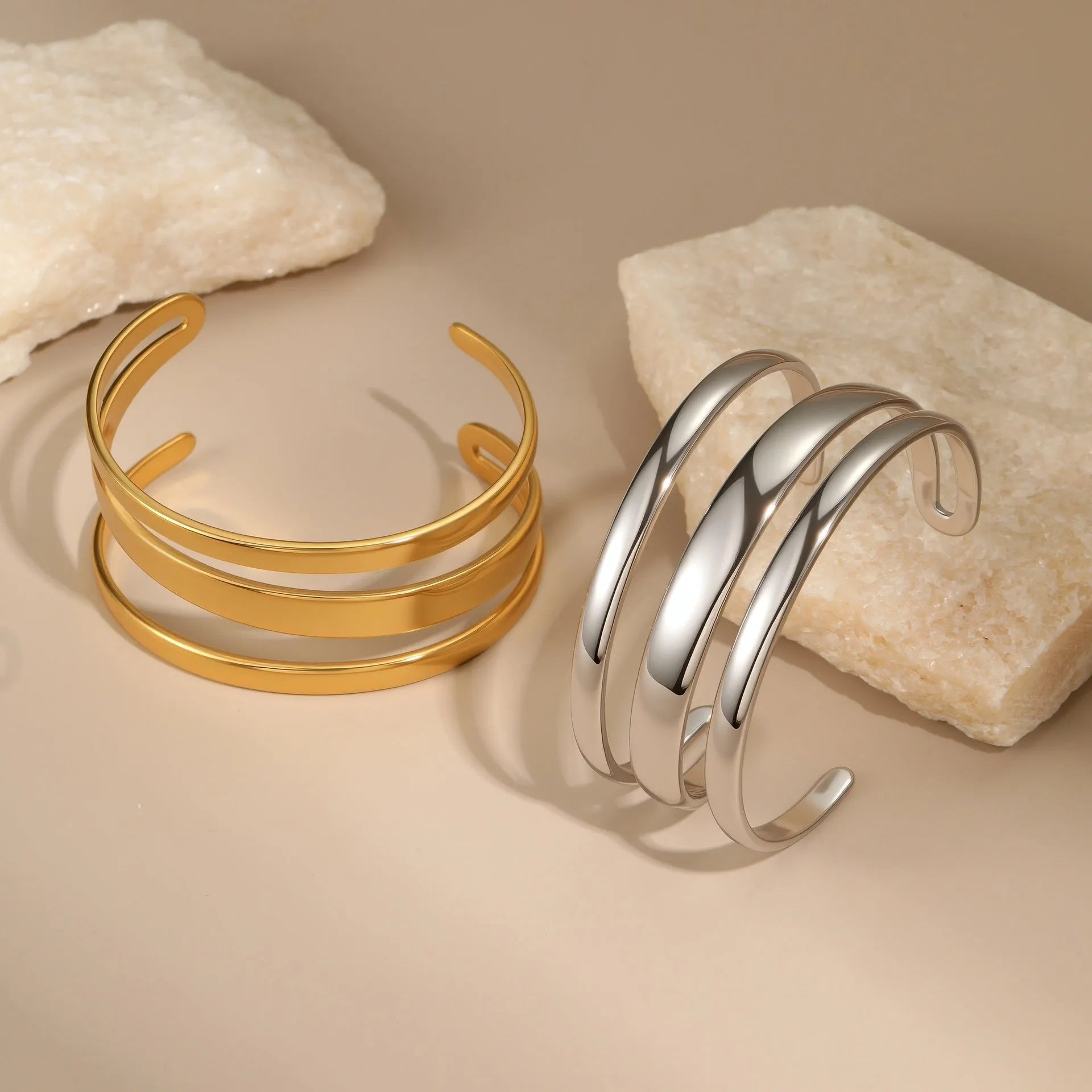 Women's stainless steel bracelet with 18K gold electroplating in geometric open design with line elements