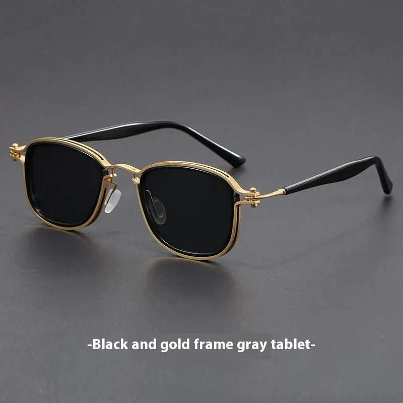 Retro style square sunglasses with a mixed metal and plastic frame and AC lenses.