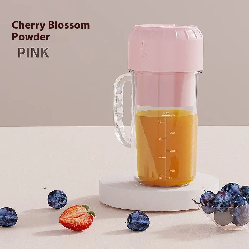 Portable USB juicer in avocado green or cherry blossom pink with a 150W motor.